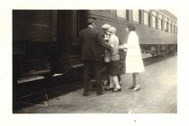 Two ladies boarding the train
